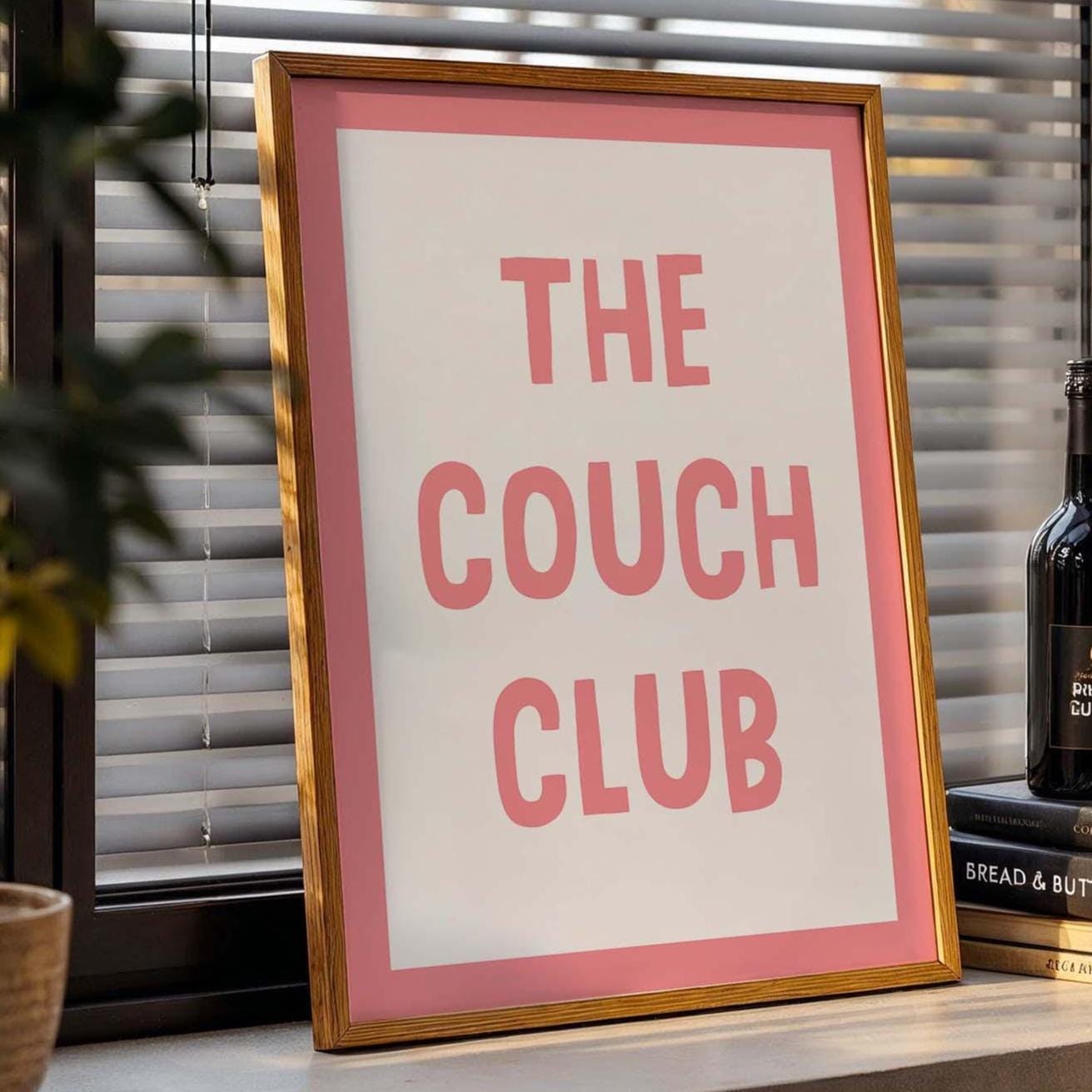 The couch club pink and white wall art print
