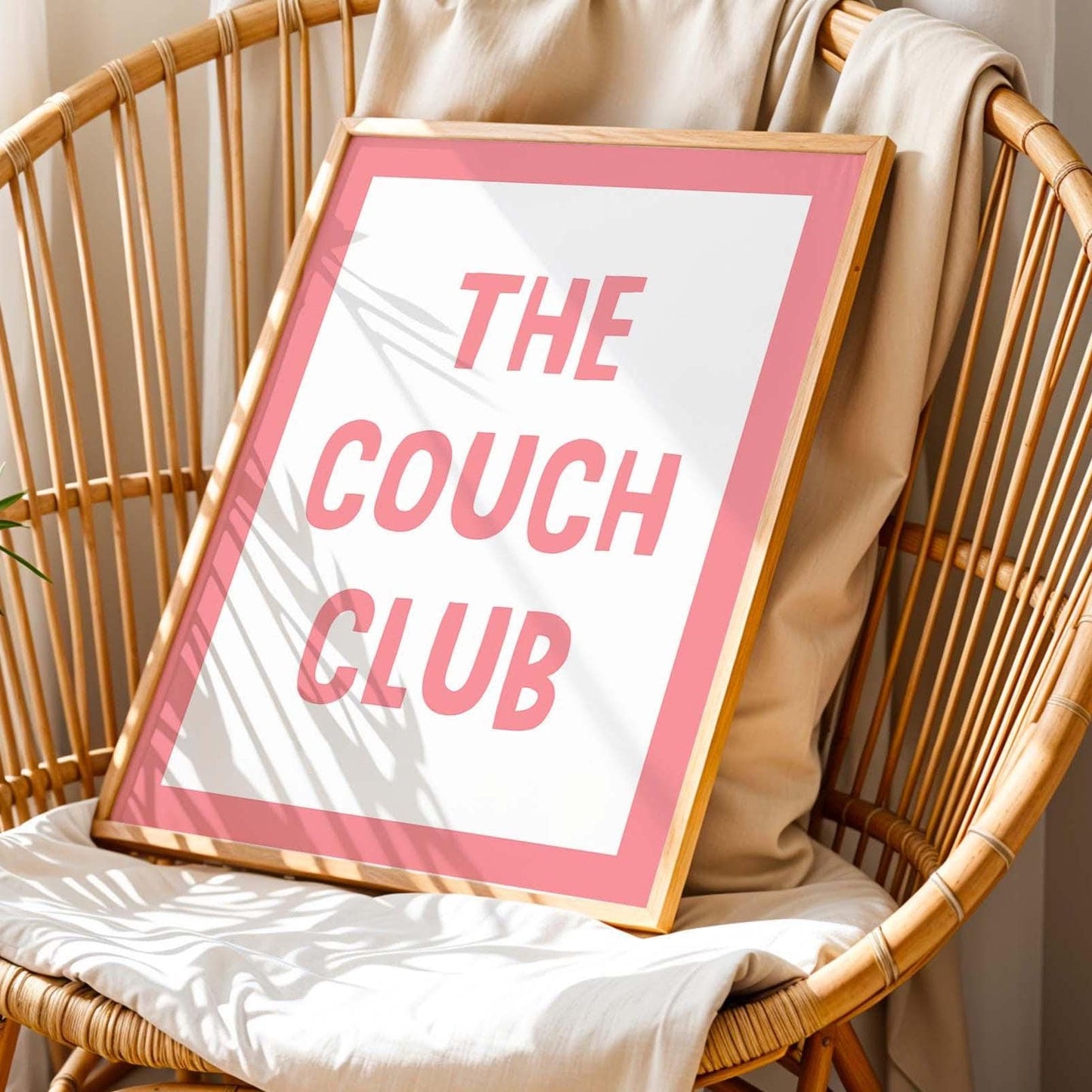 The couch club pink and white wall art print