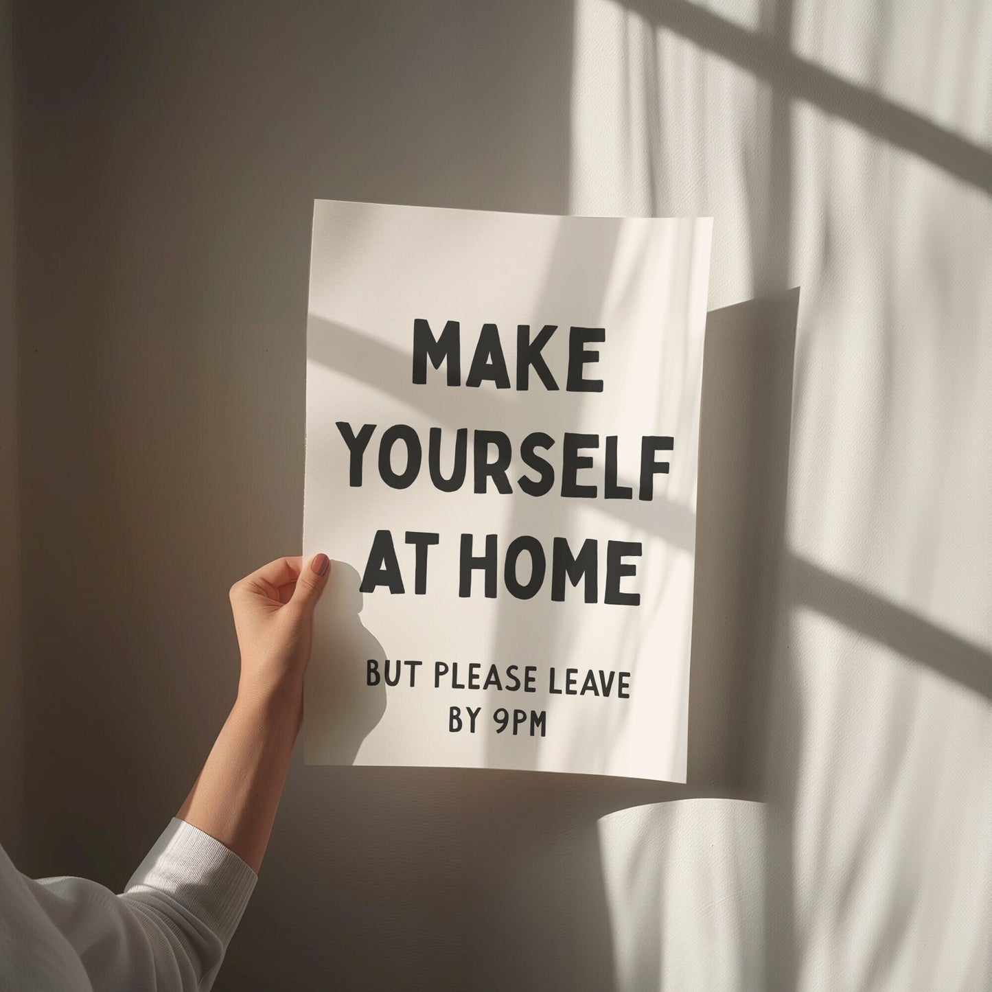 make yourself at home but please leave by 9pm wall print