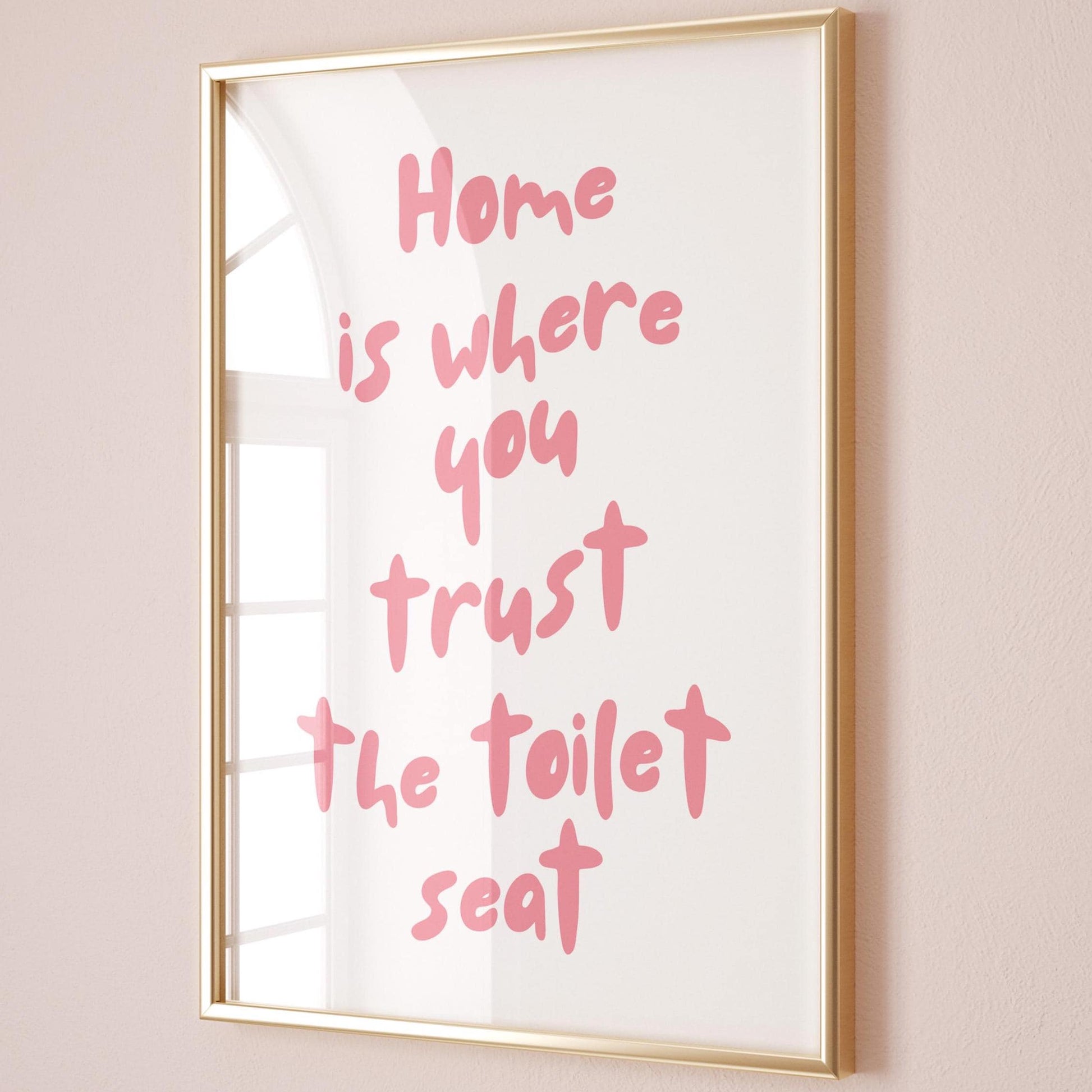 Home Is Where You Trust The Toilet Seat Wall Art Pink and White