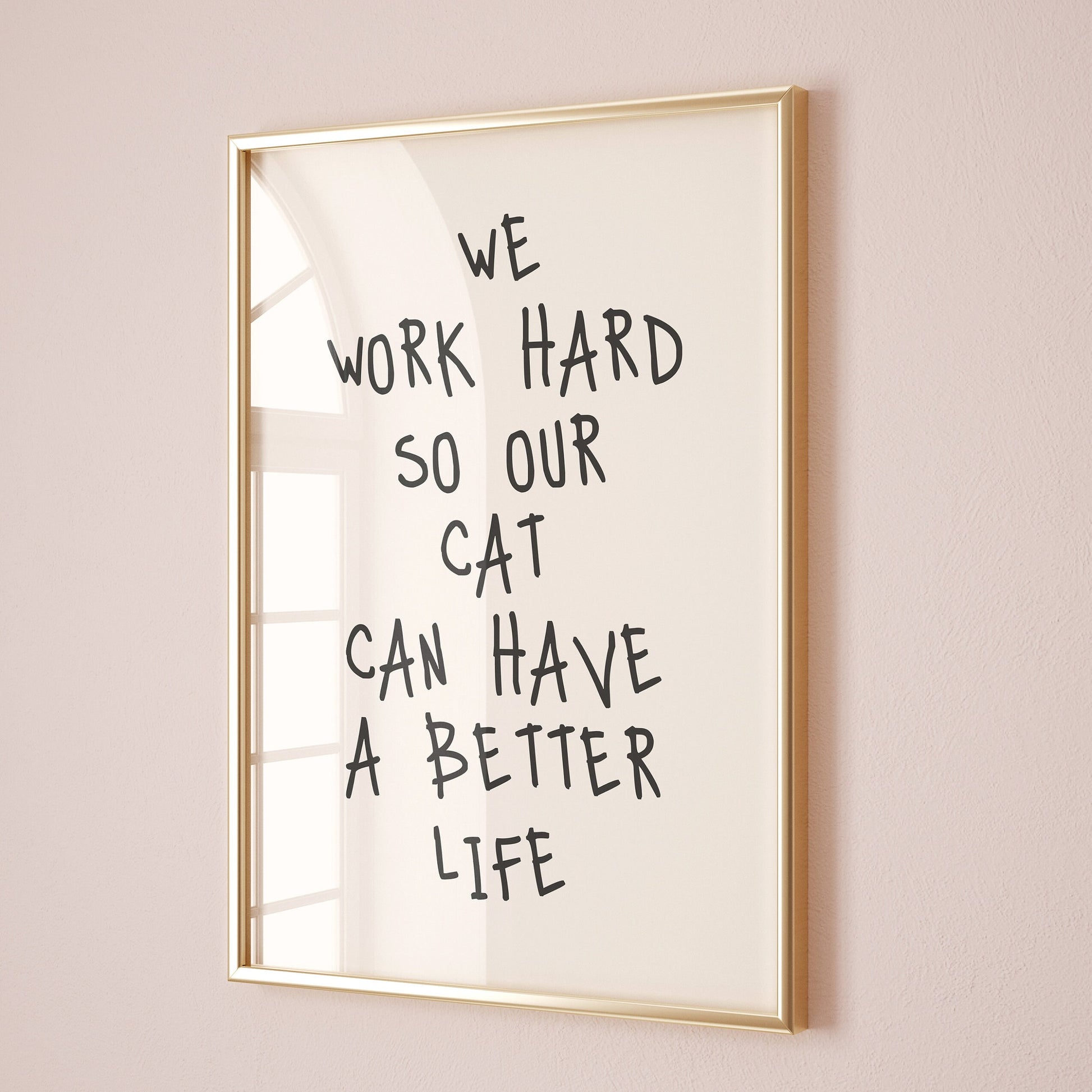 we work hard so our cat can have a better life wall print
